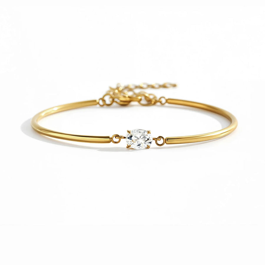 Open cuff bracelet with solitaire gemstone in gold finish