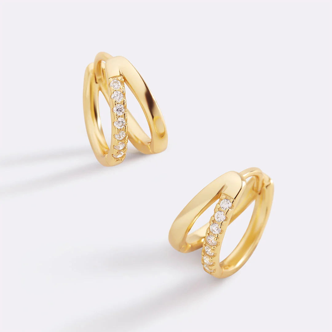 Double huggie hoop earrings in gold with crystal row