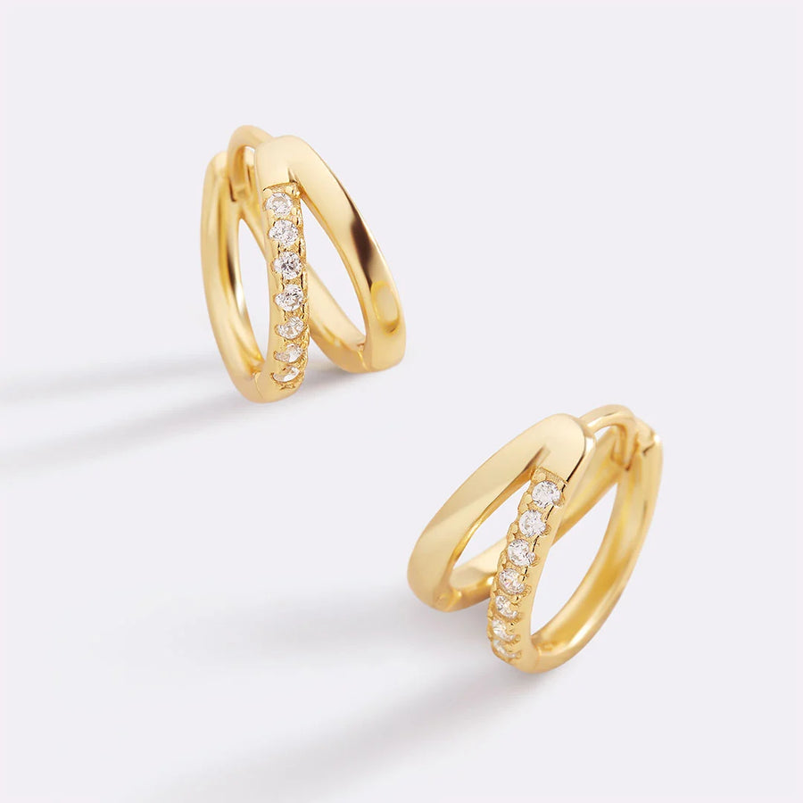 Double huggie hoop earrings in gold with crystal row